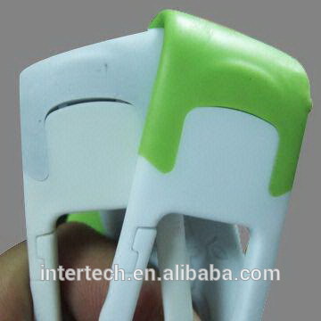 Green and white elastomer plastics molding